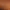 Une personne allongée sur le ventre reçoit un soin du visage avec une bande sur le front et un bol à proximité